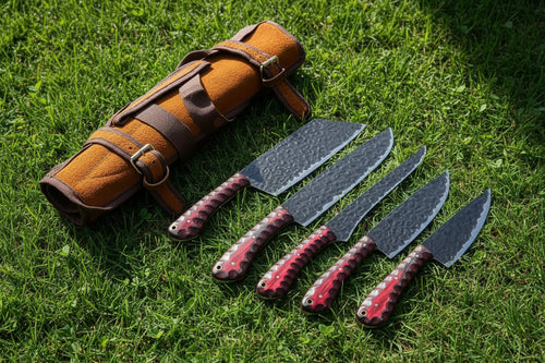 Set of knives with decorative handles on a white background