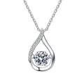 Teardrop moissanite pendant on a sterling silver Cuban link chain