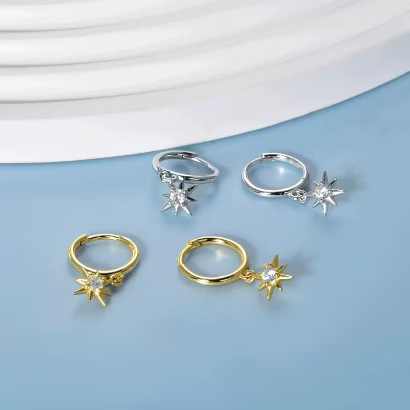 North star drop earrings on small huggie hoops