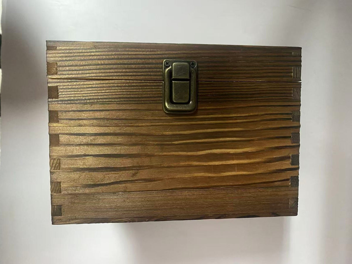 Front of the hinged wooden whiskey gift box with metal clasp